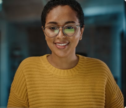 woman_smiling_looking_at_screen