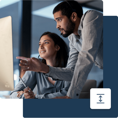 Two_collegues_working_looking_at_monitor