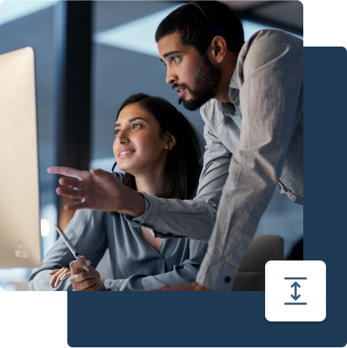 Two_collegues_working_looking_at_monitor