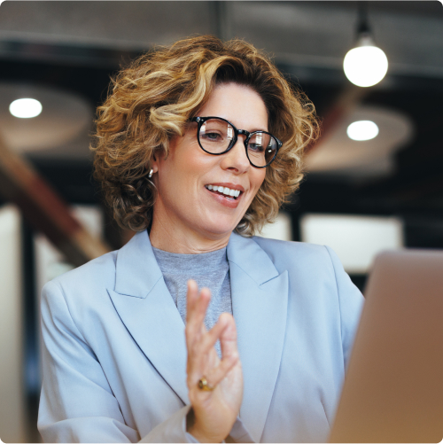 Business_woman_waving_on_video_call