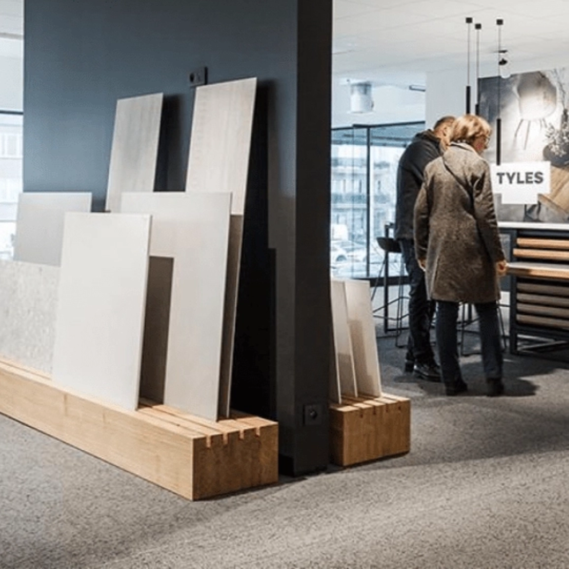 Customers visiting a tile-wholesale showroom