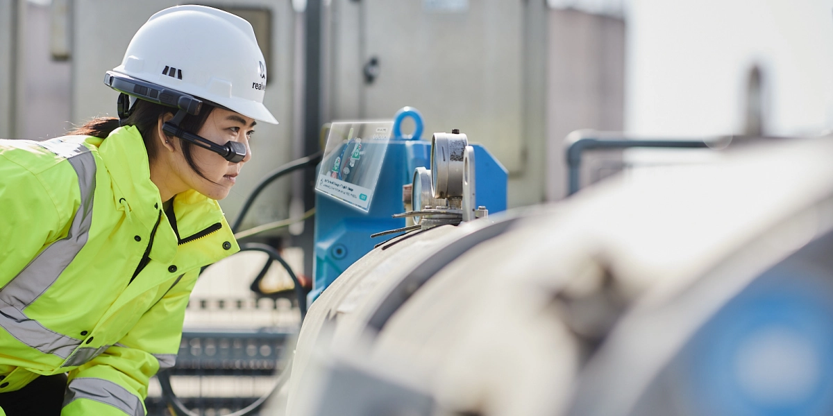 oil plant worker with extended reality video gear