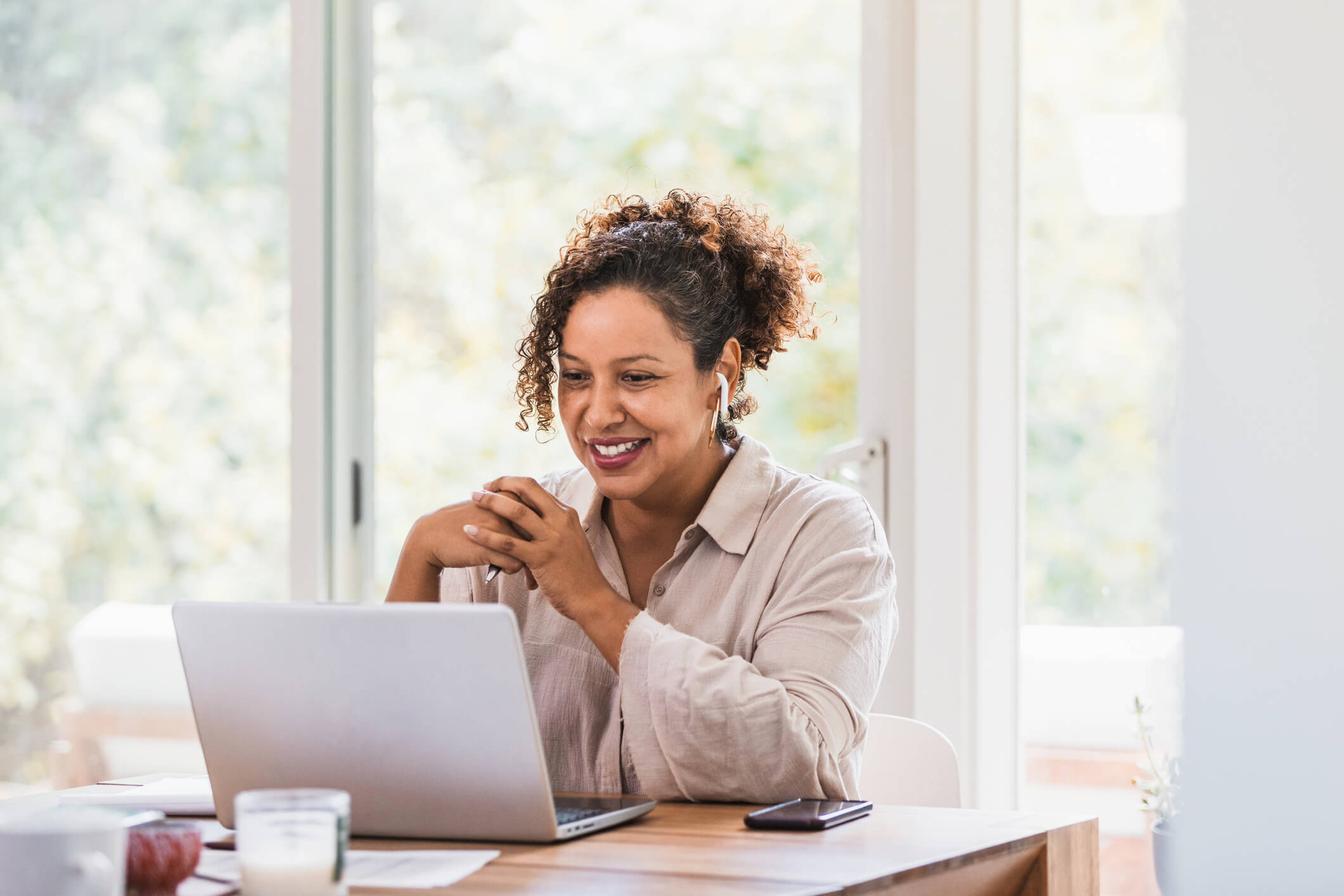 Woman on a video call with government official